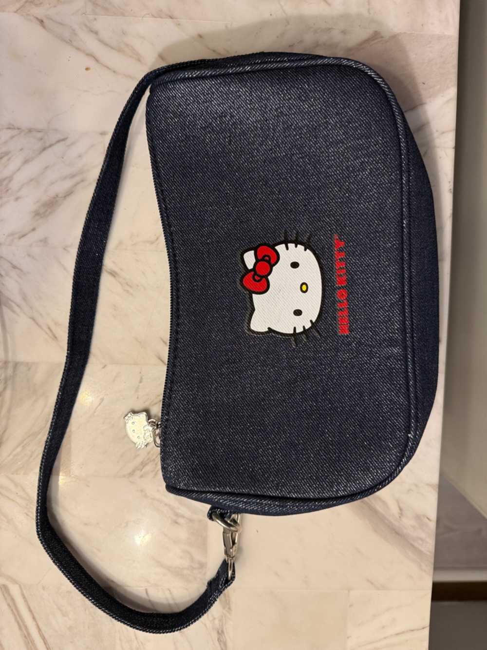 Hello Kitty Dark Blue Denim Wristlet with Red Bow Accent